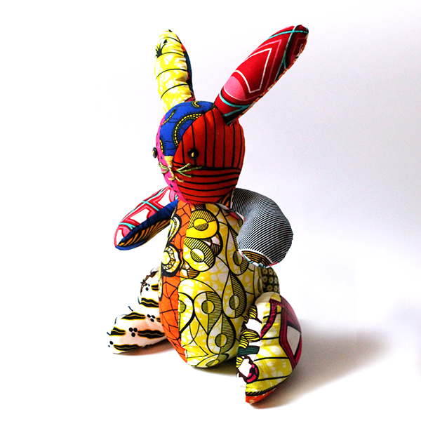 Handmade Ewii patchwork rabbit crafted from colorful remnant textiles.