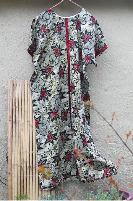Black, white, and red full length kaftan - bubu gown with red velvet trim. noraokafor