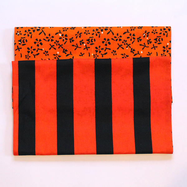 orange black reversible prints table runner