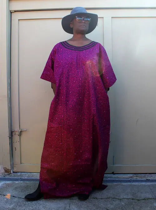 Full length kaftan - bubu gown in magenta with black velvet trim.